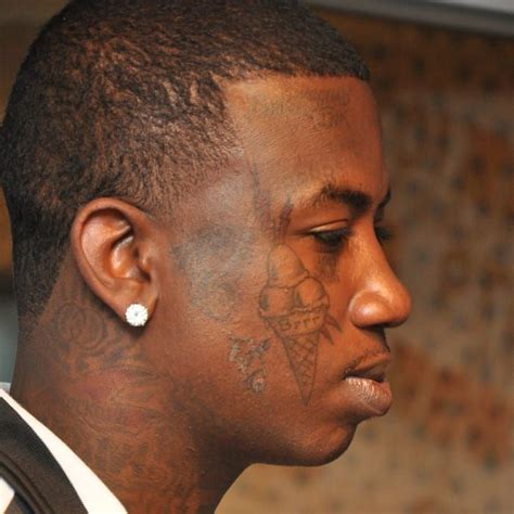 gucci mane face tattoos.